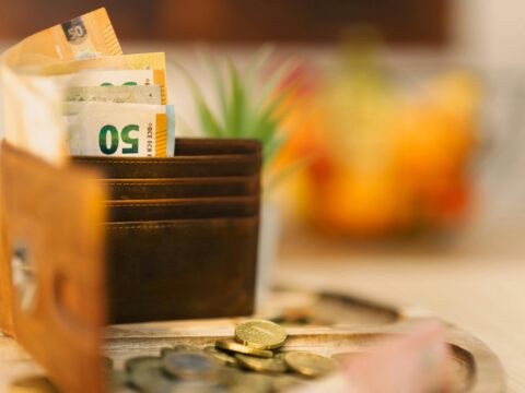 How to Save Money While Paying Off Debt Faster